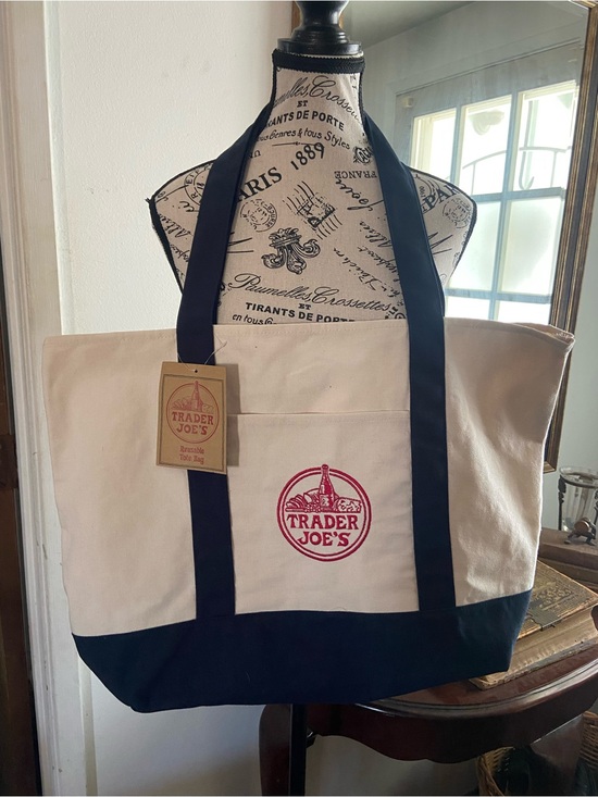 Trader Joe'S Handbags - Trader Joe's Canvas Tote in Cream and Black with Red Logo